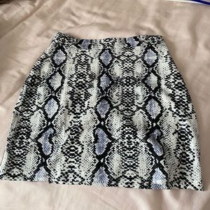 Snake print skirt with white blue and black